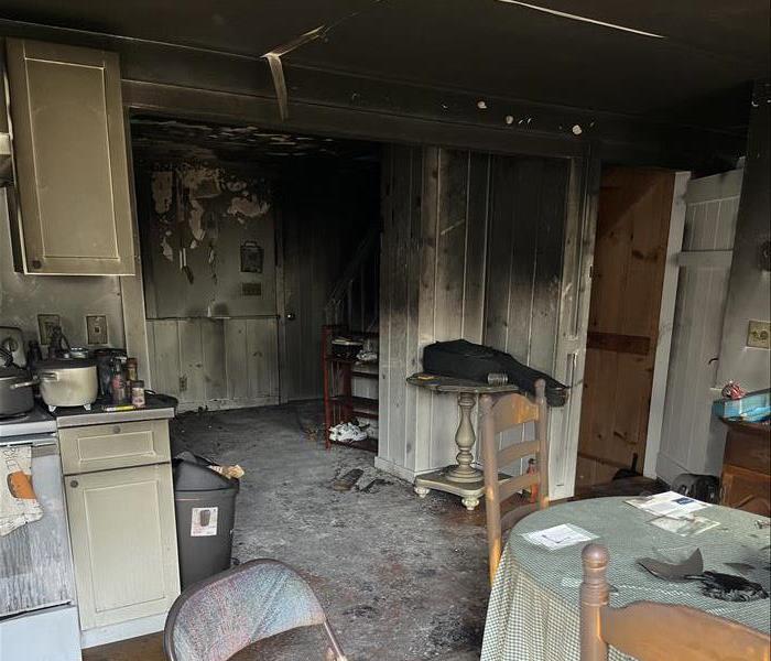 fire damaged kitchen, soot on walls